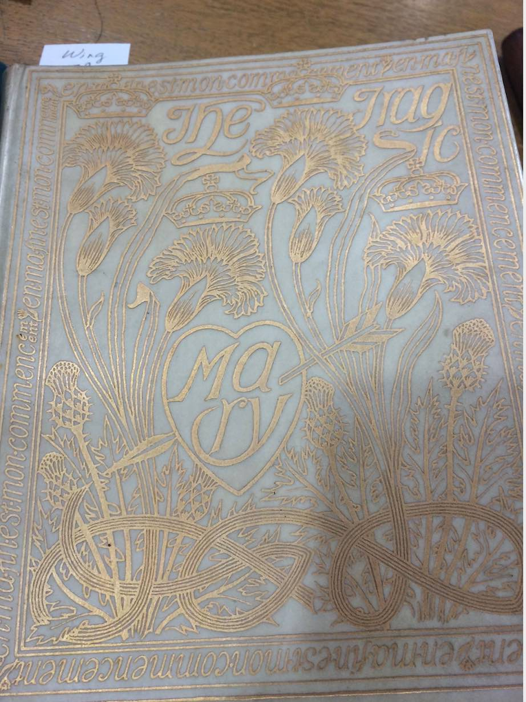The highly ornate cover of Michael Field’s The Tragic Mary, decorated with golden thistles 